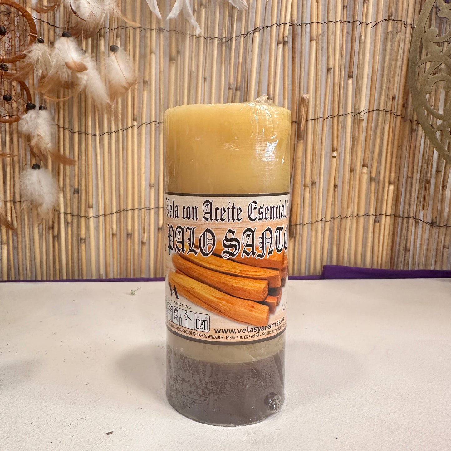 Velón con aceite esencial de palo santo